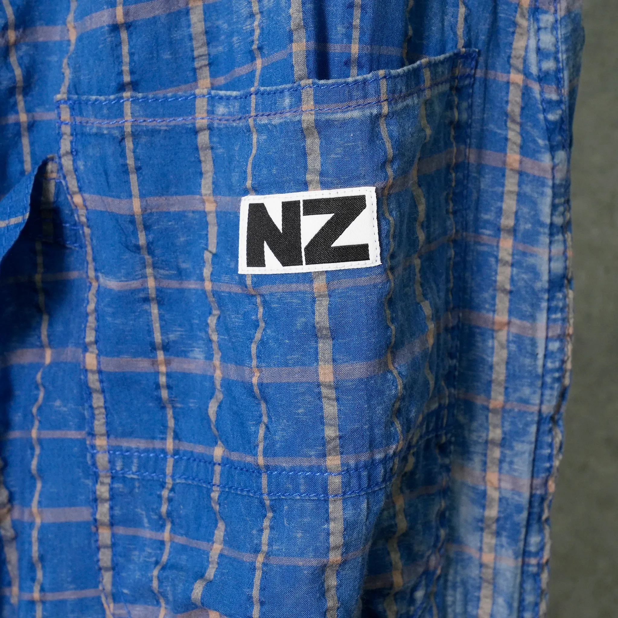 TREATED PANTS / BLUE CHECKED